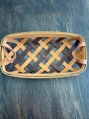 Henn Workshops basket,tan/dark brown/red,leather handles,open weave, 7x13” 2004